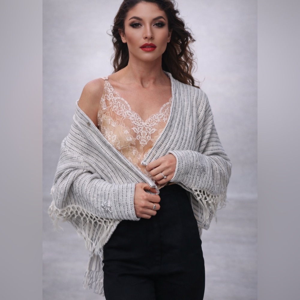Lucia’s Sarto White and navy fringe sweater jacket with silver rhinestone stars